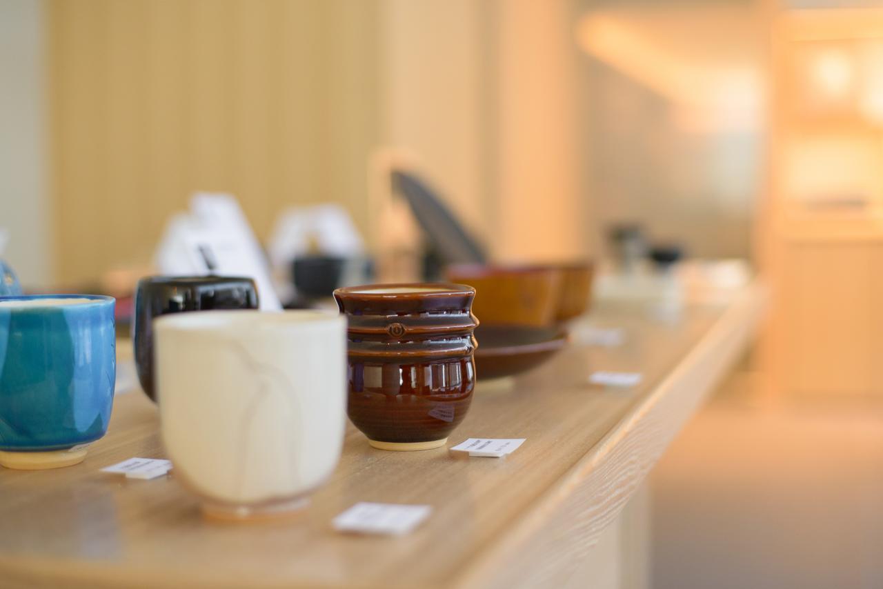 Kanazawa Tokyu Hotel Экстерьер фото A small collection of the many objects that can be used for a game of goban
